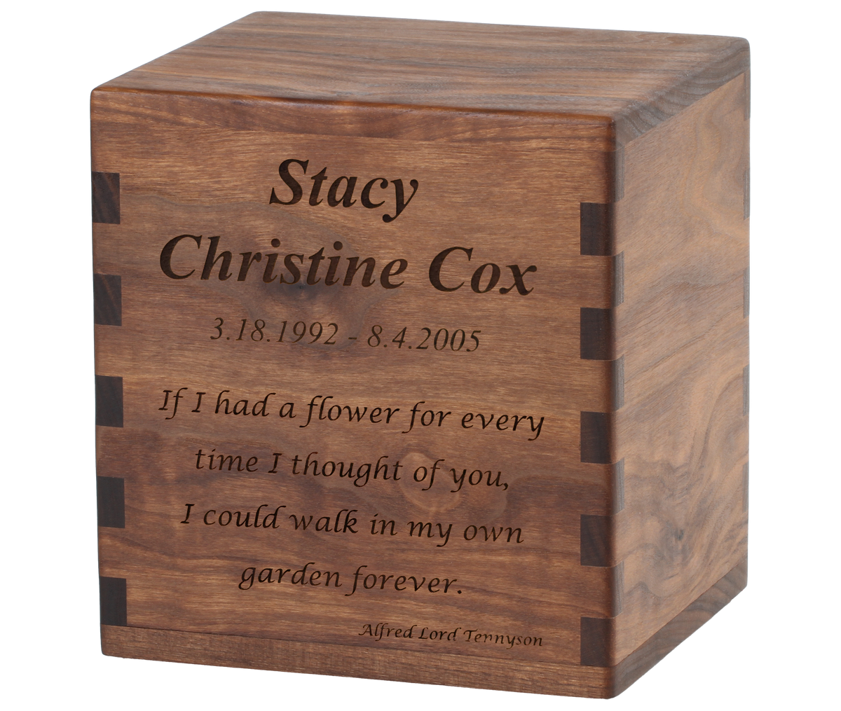 Cremation urn with laser engraving showing a comforting quote.