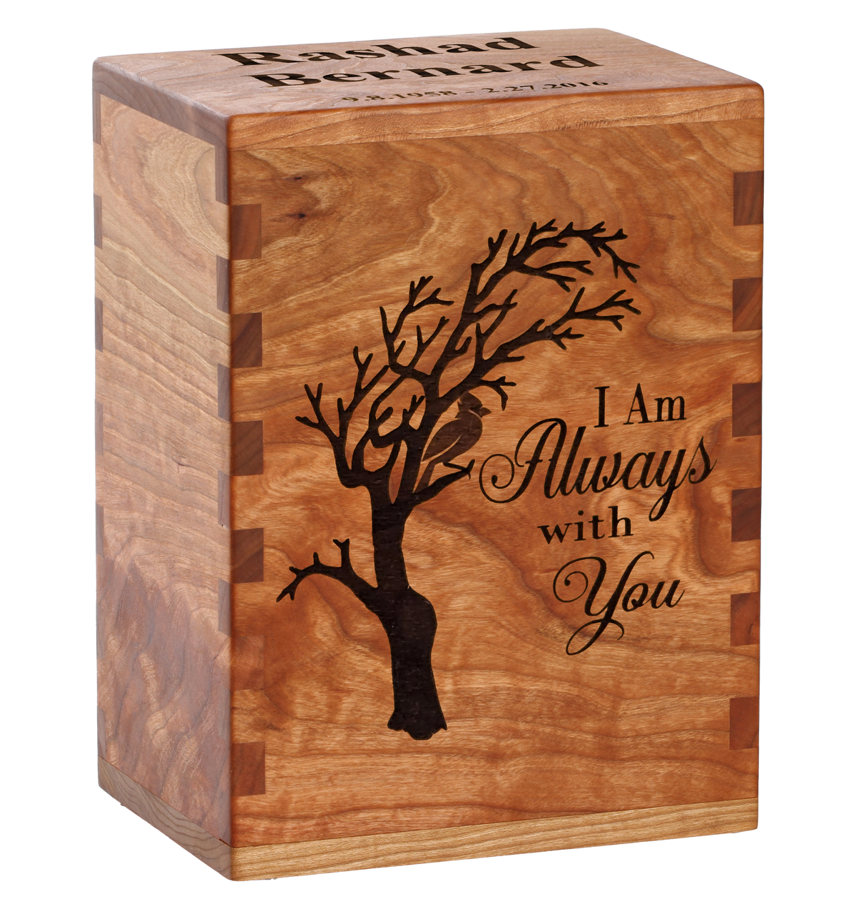 Custom cremation urn with laser engraving of a cardinal in a tree.