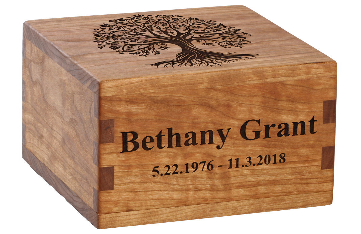 Custom cremation urn with laser engraving of the Tree of Life.