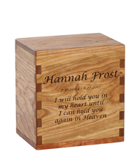 Personalized wooden cremation urn handcrafted in Cherry with custom laser engraving.