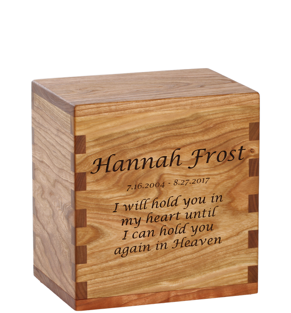 Personalized wooden cremation urn handcrafted in Cherry with custom laser engraving.