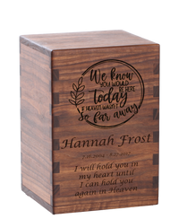 Personalized wooden cremation urn handcrafted in Walnut with custom laser engraving.