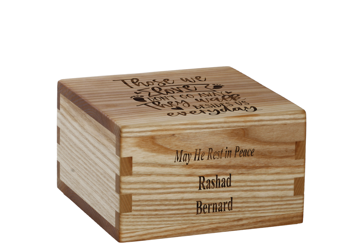 Personalized wooden cremation urn handcrafted in Ash with custom laser engraving.