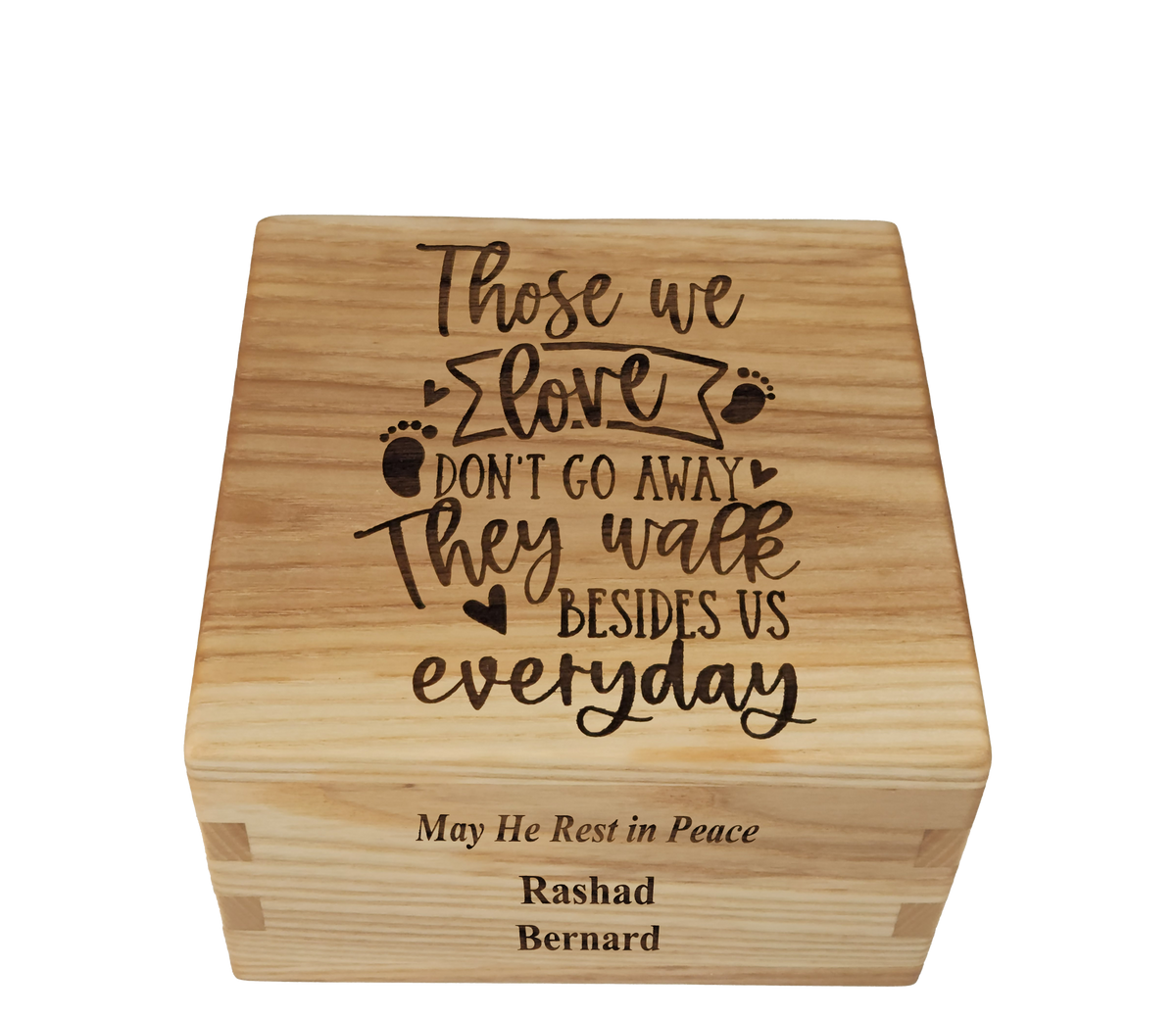 Personalized wooden cremation urn handcrafted in Ash with custom laser engraving.