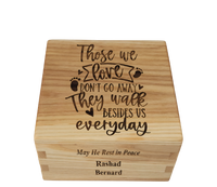 Personalized wooden cremation urn handcrafted in Ash with custom laser engraving.