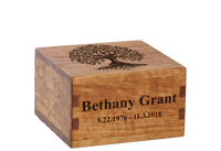 Personalized wooden cremation urn handcrafted in Cherry with custom laser engraving.