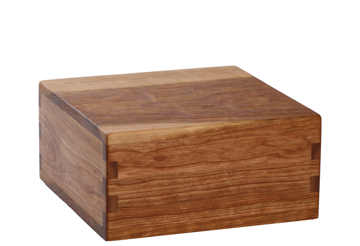 Wood cremation urn handcrafted in Cherry.