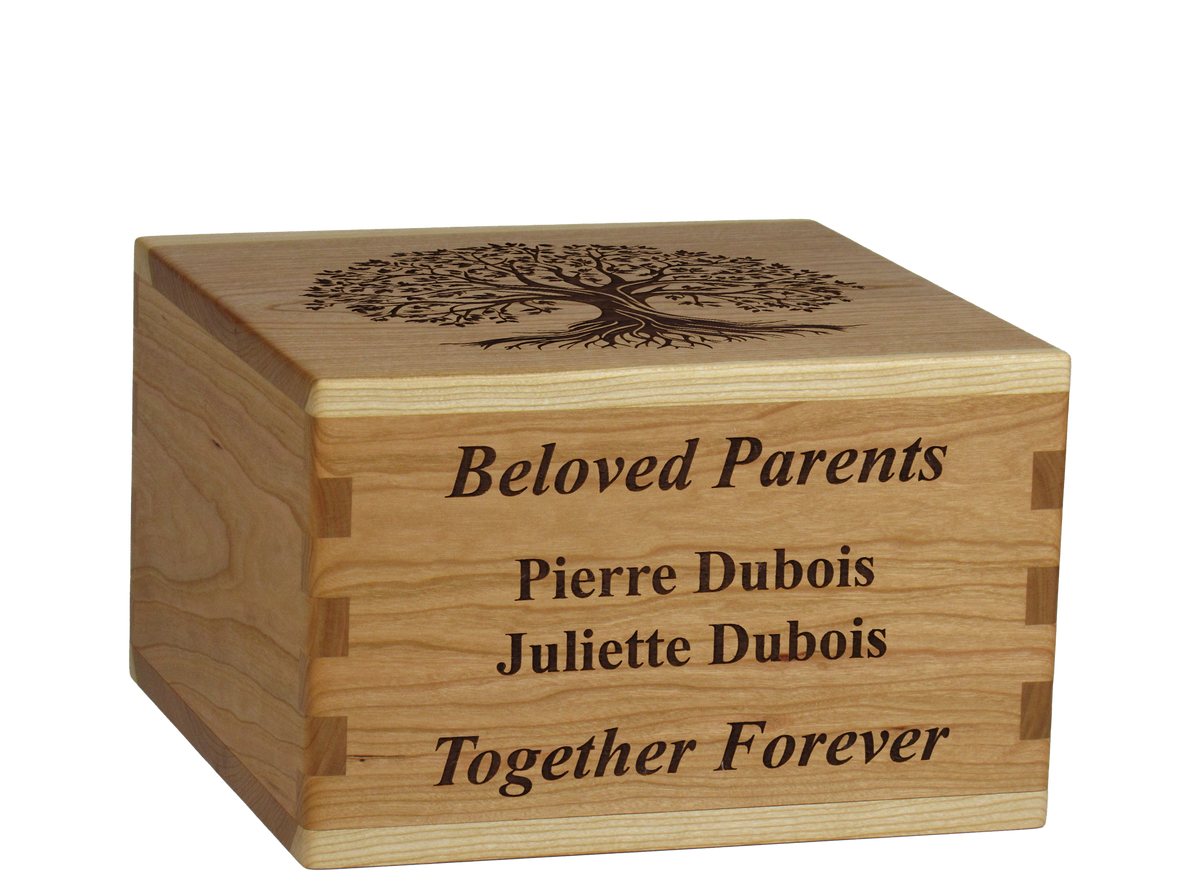 Personalized wooden cremation urn handcrafted in Cherry with custom laser engraving.