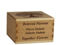 Personalized wooden cremation urn handcrafted in Cherry with custom laser engraving.