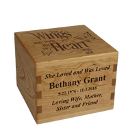 Personalized wooden cremation urn handcrafted in Cherry with custom laser engraving.