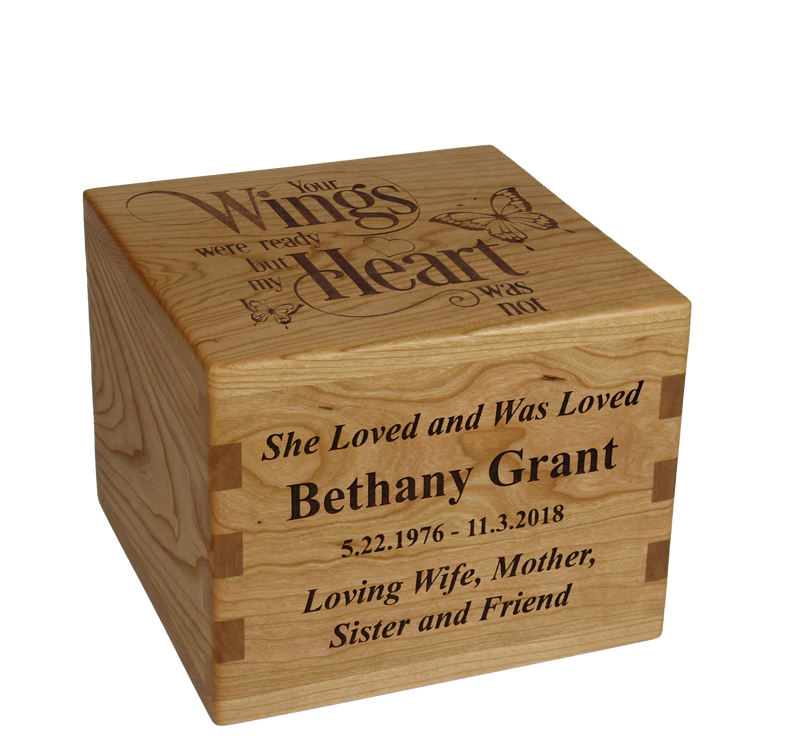 Personalized wooden cremation urn handcrafted in Cherry with custom laser engraving.