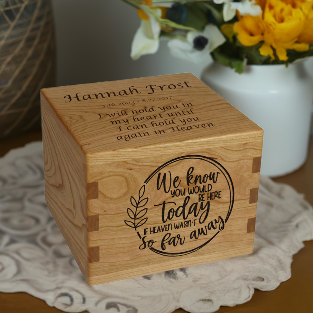 Personalized wooden cremation urn handcrafted in Cherry with custom laser engraving.