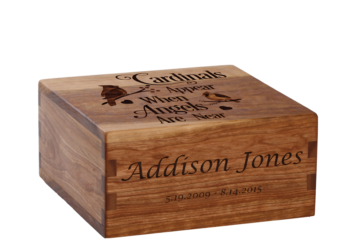 Personalized wooden cremation urn handcrafted in Cherry with custom laser engraving.