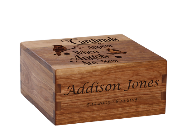 Personalized wooden cremation urn handcrafted in Cherry with custom laser engraving.