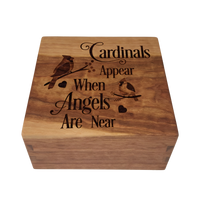 Personalized wooden cremation urn handcrafted in Cherry with custom laser engraving.