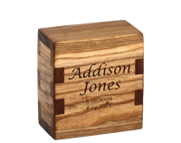 Personalized wooden keepsake cremation urn handcrafted in Ash with custom laser engraving.