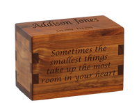 Personalized wooden keepsake cremation urn handcrafted in Canarywood with custom laser engraving.