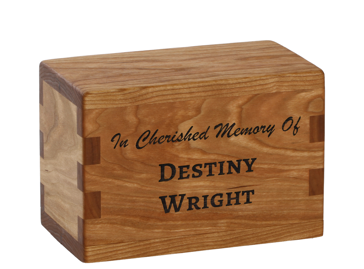 Personalized wooden keepsake cremation urn handcrafted in Cherry with custom laser engraving.