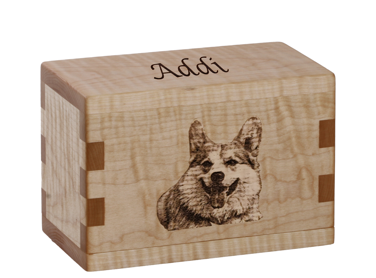 Personalized wooden pet cremation urn handcrafted in Curly Maple with custom laser engraving.