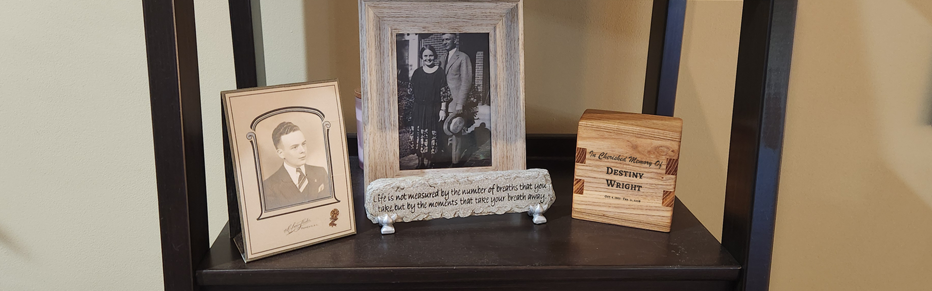 Keepsake cremation urn displayed on a shelf.