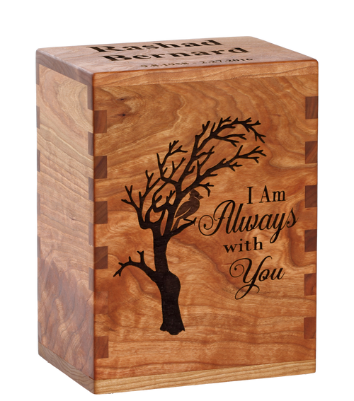 Classic cremation urn with personalized laser engraving of a cardinal in a tree.