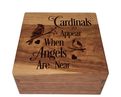 Craftsman cremation urn with personalized laser engraving of cardinals.