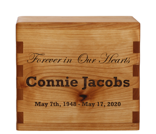 Classic cremation urn with personalized laser engraving.