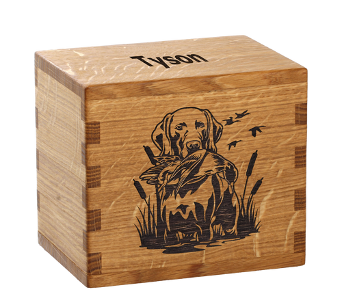 Pet cremation urn with personalized laser engraving of a hunting dog.