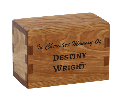 Keepsake cremation urn with personalized laser engraving.