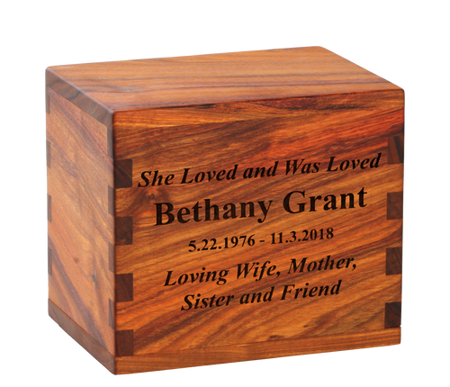 Classic cremation urn with personalized laser engraving and sentiment.