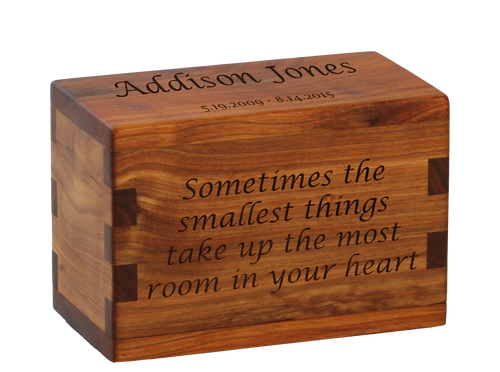 Keepsake cremation urn with personalized laser engraving and poem.