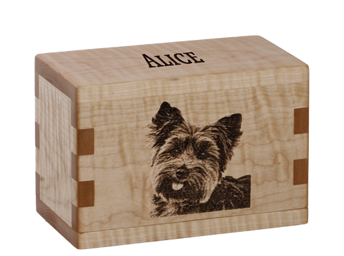 Pet cremation urn with personalized laser engraving of a Yorkie.