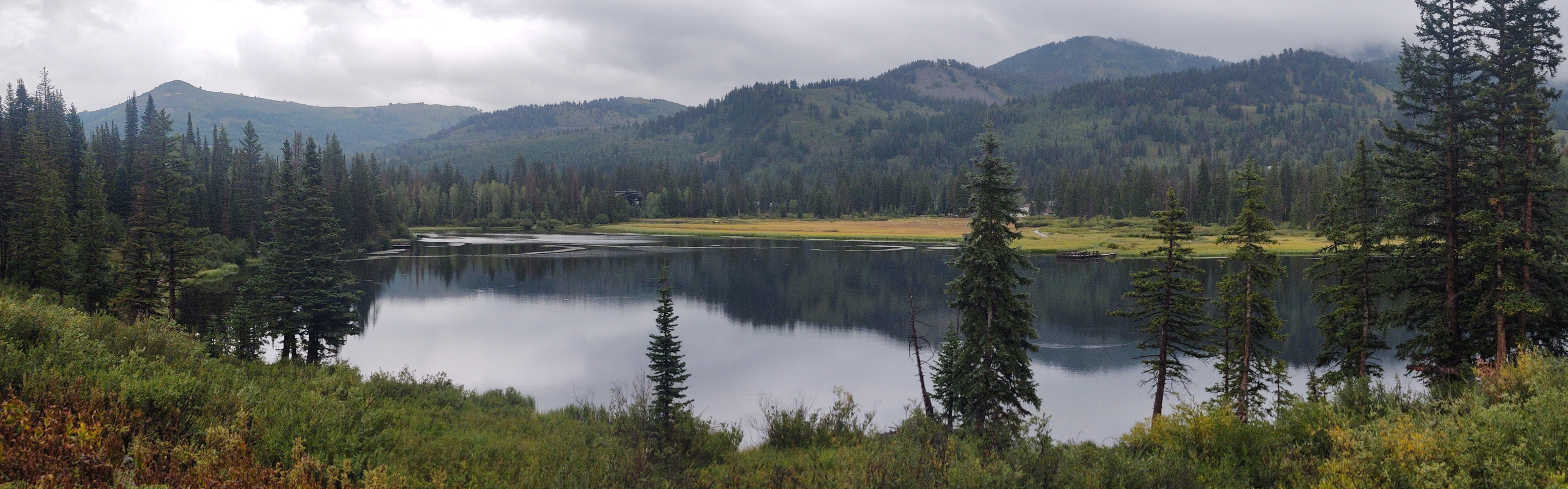 Mountain lake scene that inspired the name River Hills Memorials.