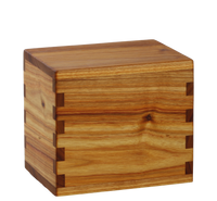 Wood cremation urn handcrafted in Canarywood.