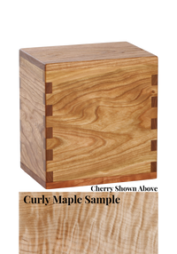 Wood cremation urn handcrafted in Curly Maple.