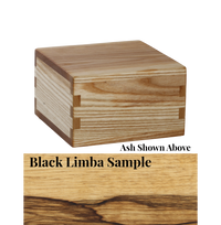 Wood cremation urn handcrafted in Black Limba.