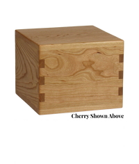 Wood cremation urn handcrafted in Cherry.