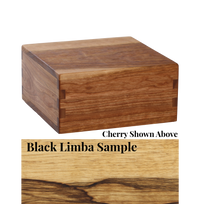 Wood cremation urn handcrafted in Black Limba.