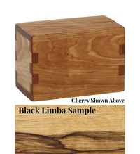 Wood keepsake cremation urn handcrafted in Black Limba.