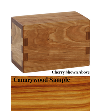 Wood keepsake cremation urn handcrafted in Canarywood.