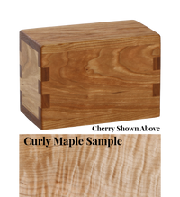 Wood keepsake cremation urn handcrafted in Curly Maple.